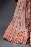 Crushed tissue saree in peach with beautiful cutwork border