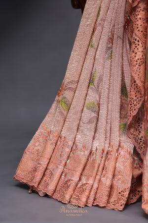 Crushed tissue saree in peach with beautiful cutwork border