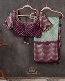 Sage Green Kanchi Bandini saree with a stunning purple border