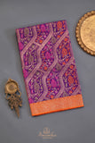 A stunning Banarasi Kora Jamdaani saree in purple