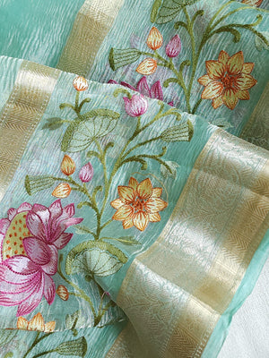 Sea Green Crush Tissue saree with a beautiful floral embroidered border