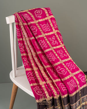 Pink Bandini gharchola saree with ajrak border and blouse