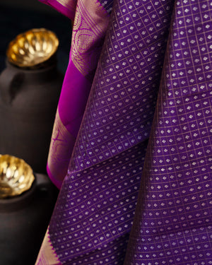 Deep purple Kanchipattu saree with contrast magenta gap border