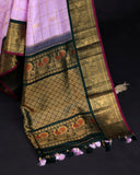 Gadwal kanchi saree in a beautiful lavender and emerald green combo