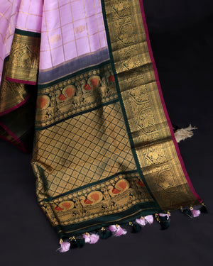 Gadwal kanchi saree in a beautiful lavender and emerald green combo