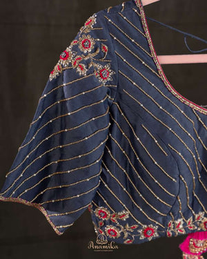 A dark navy blouse in pure silk with beautiful embroidery