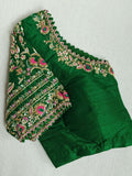 A stunning blouse in leaf green color with beautiful embroidery