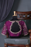 A classic patola in purple with a striking border
