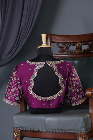 A classic patola in purple with a striking border