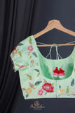 Mint Green Crepe Floral saree with hand worked border