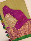 Royal Gadwal kanchiPattu saree in a beautiful parrot green and magenta combination