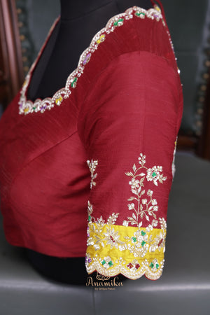 Patan Patola saree with intricately designed maggam work border
