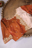 A beautiful vintage kanjeevaram in coppery rust with an ivory border