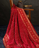 A beautiful red saree - Bandini Crepe with Patola