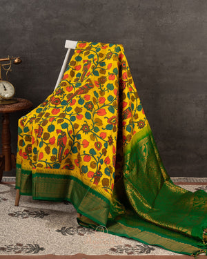 Yellow Gadwal saree with pen kalamkari print