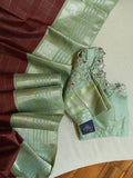 Kanjeevaram saree in a unique combo of maroon and mint green
