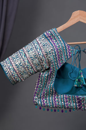 Designer Georgette Saree in hues of blue, green and purple