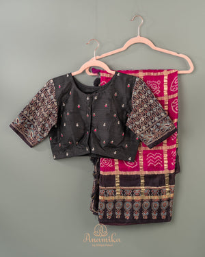 Pink Bandini gharchola saree with ajrak border and blouse