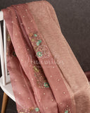 Crushed Tissue saree with embroidered thread work buttas