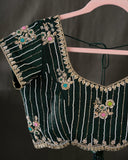 Banarasi Silk Saree in a dark emerald color