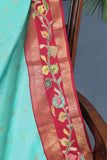 Sky Blue and red kanjeevaram with floral applique border