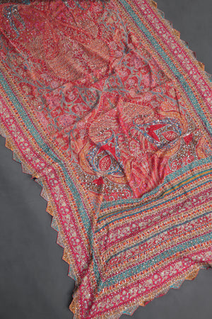 Designer Georgette Saree in hues of orange, peach, red and pink