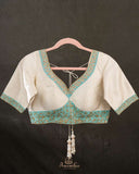 Off white blouse with blue patchwork embroidery