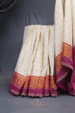 Patan Patola saree with intricately designed maggam work border