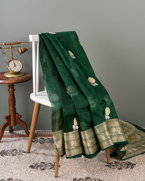 Banarasi Organza Saree in dark green with a floral blouse