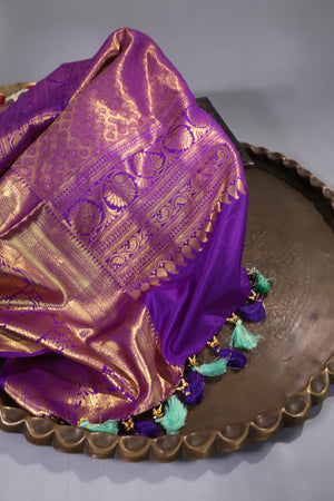 Mint Green Kanjeevaram saree with a purple border