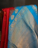 Timeless Gadwal Pattu saree in regal red color