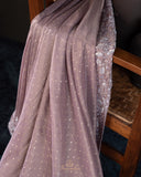 Brocade tissue georgette sarees with intricately embroidered border