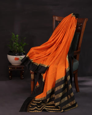 Orange mysore crepe silk saree with a stunning blouse pattern