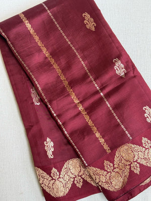 Raw  mango Pattu saree in maroon paired with a contrast mauve lilac blouse