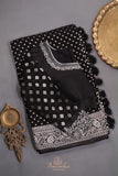 A graceful black Georgette saree with stylish full sleeves blouse