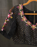 Muslin jamdaani saree in black with all over floral weave