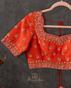 Orange Elbow sleeves blouse with intricately designed zardosi work