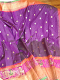 A Royal Gadwal kanchi saree in purple with contrast turning meena border