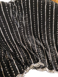 Falling organza saree in black with all over sequins work