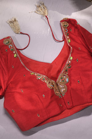A stunning jewelry work blouse in red