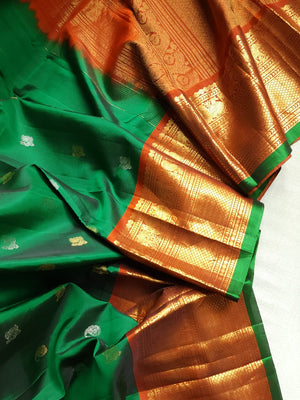 Traditional Green and rust orange Kanchipattu saree