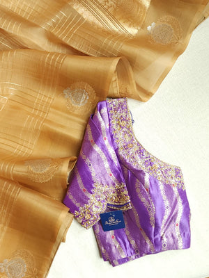 Organza saree in golden hue wit a beautiful blouse