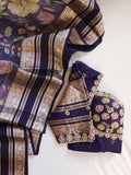 A purple Kota silk saree with beautiful floral prints