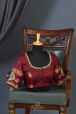 Peach and maroon kanjeevaram with floral applique border