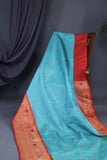 Aqua blue Gadwal saree with meenakari floral border in orange