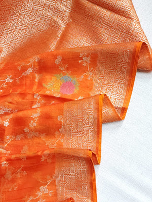 Deep Orange Munga silk saree with contrast off white puff sleeves blouse