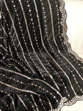 Falling organza saree in black with all over sequins work