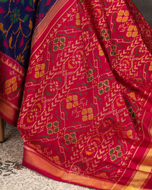 Patola silk saree in a lovely blue shade with pink border