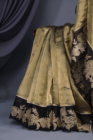 Banarasi tissue saree in stunning black and antique gold combo