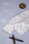 Elegant Crush Tissue saree in pastel blue with a stunning mirror work blouse